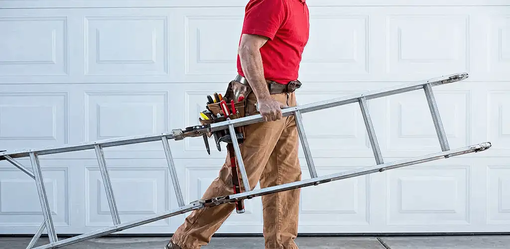 Garage door repair technician arriving with tools and ladder in Tallahassee, FL