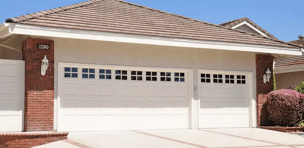 Residential garage door repair service for a double garage door in Tallahassee, FL