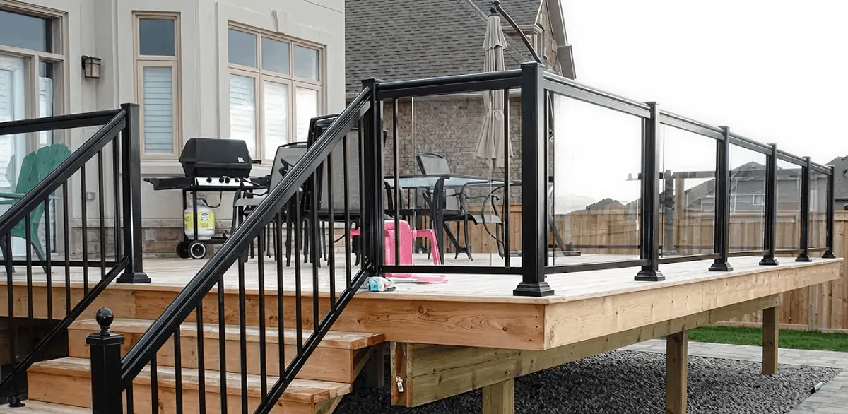 Handrail installation on a deck staircase for safety and code compliance in Tallahassee, FL