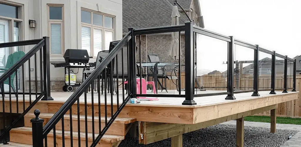 Handrail installation on a deck staircase for safety and code compliance in Tallahassee, FL
